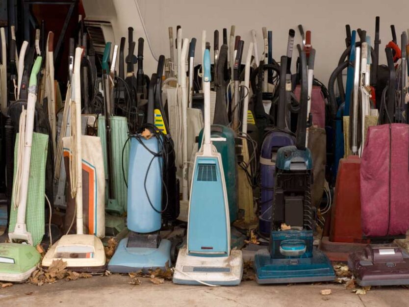 picture-of-old-handheld-vacuum-cleaners-covered-web